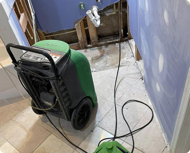 Mold remediation crew completing final work ahead of post-remediation clearance testing